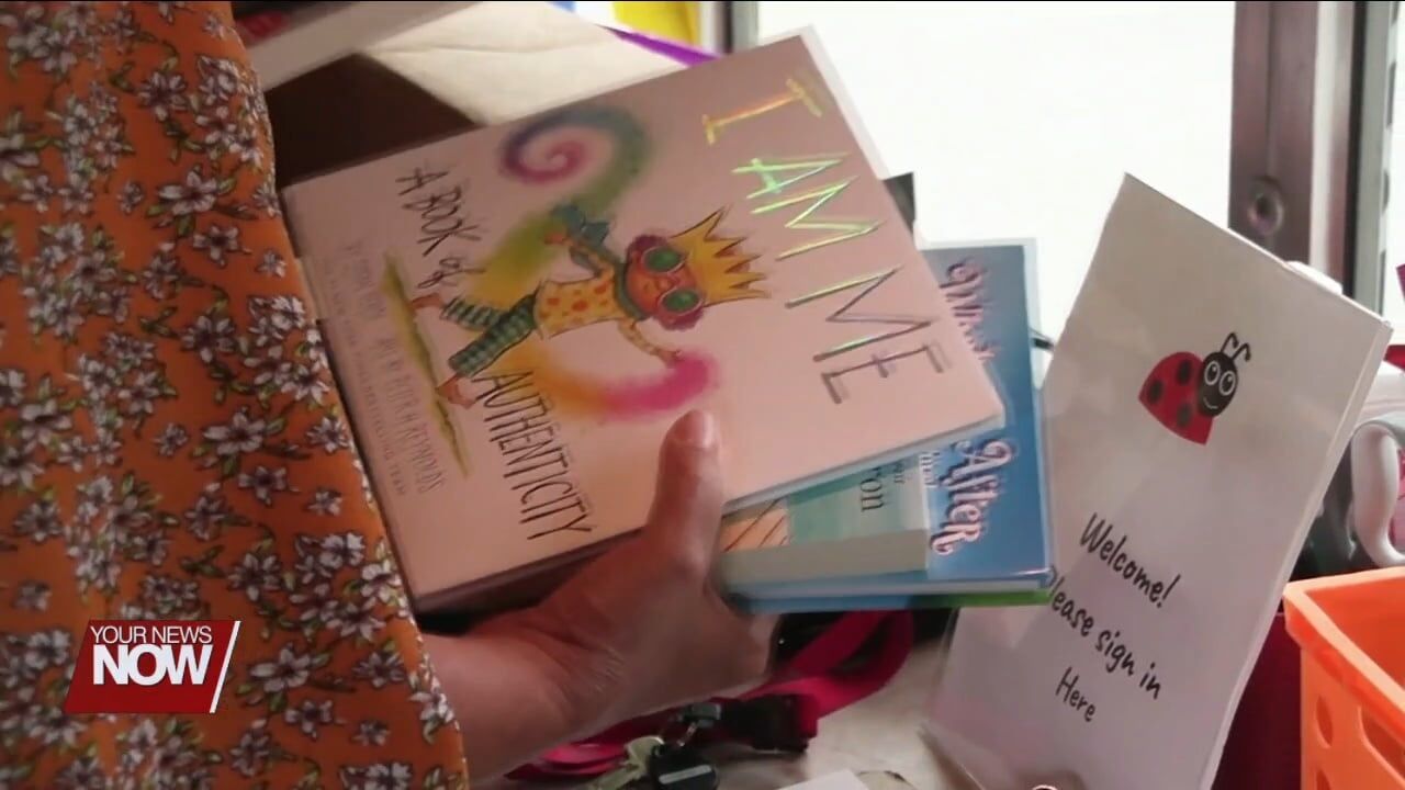 Lima City Schools' Spartan Ride receives book donation from OSU Lima Education Club